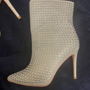 Beautiful like new rhinestone booties. Only worn once. Size 8.5